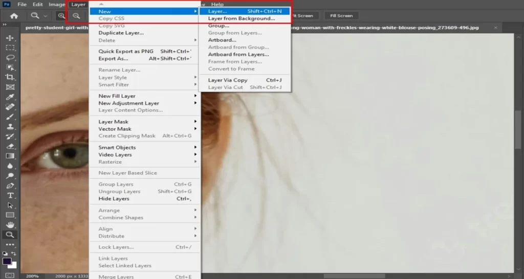 select the photoshop brush tool to paint over the frizzy areas