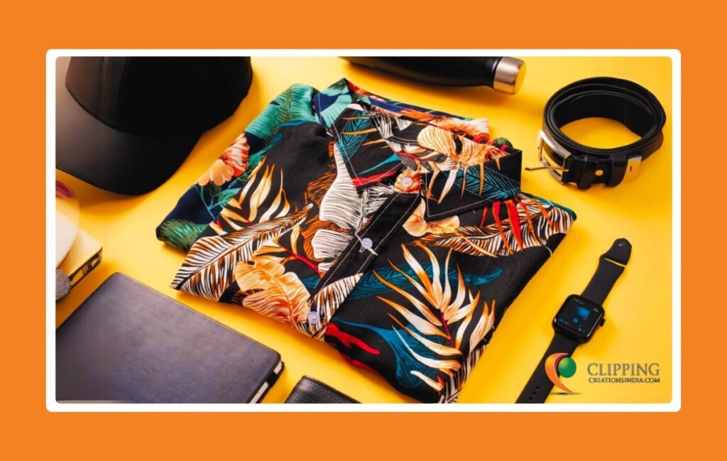 Flat lay product photo featuring summer clothing with watch, belt, and cap as props.